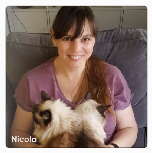 Nicola, founder of Purrtastic Presents, holding Peggy and Sally